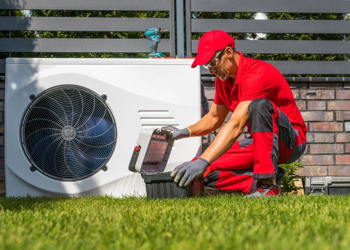 Technician preparing tools for ac installation in Chattanooga